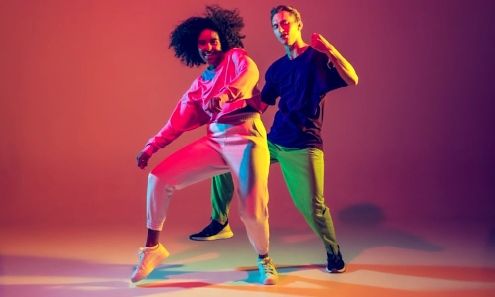 dance-time-stylish-men-woman-dancing-hip-hop-bright-clothes-green-background-dance-hall-neon-light